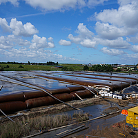 Dewatering site with operational SoilTain Dewatering Tubes stacked two high 