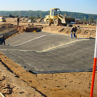 Geotessili in azione: installazione professionale di HUESKER