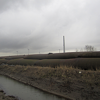 SoilTain Dewatering Tubes after six-month storage period at dewatering site SoilTain Dewatering Tubes after six-month storage period at dewatering site